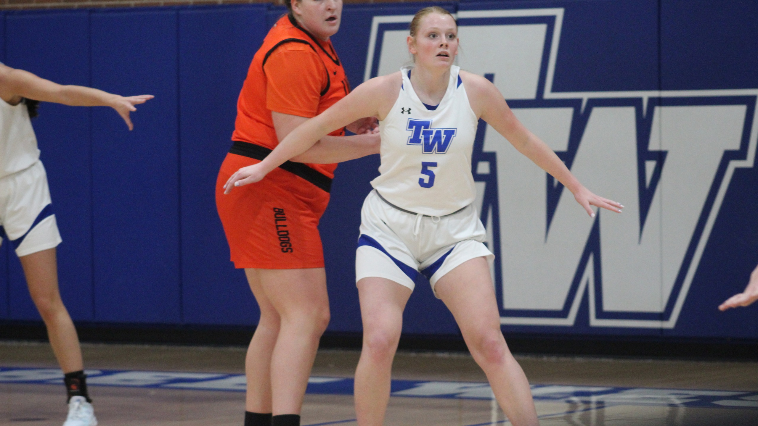 Women's Basketball Extinguish Flames